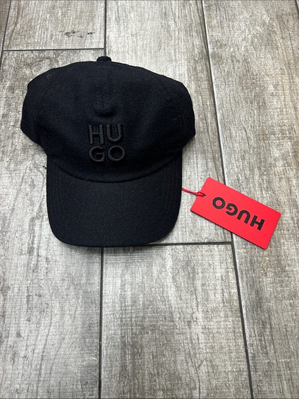 100% Authentic HUGO by Hugo Boss Men’s Black Embossed Logo Cap with Red Tag NWT
